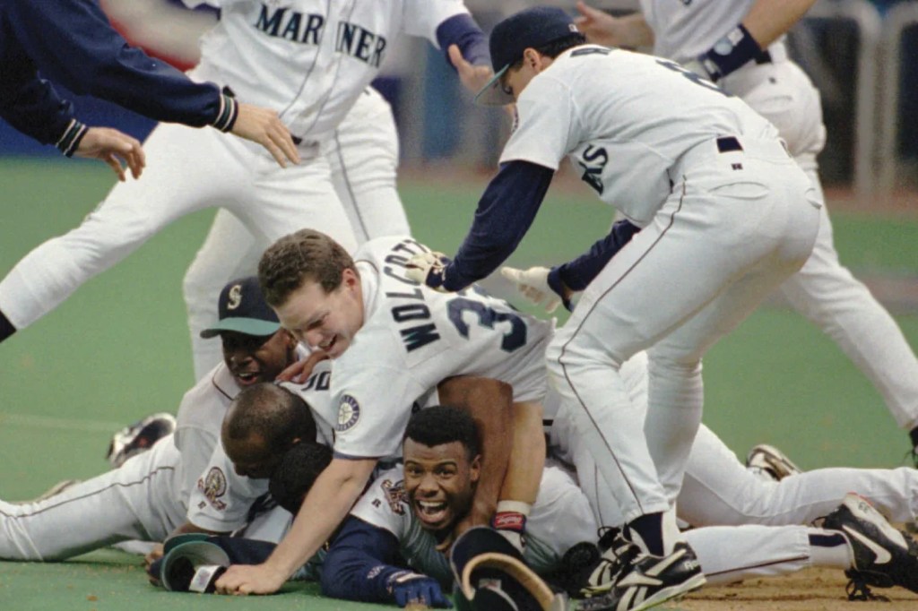 Griffey at the bottom of a dog pile.